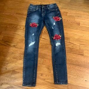 Rose patched skinny jeans